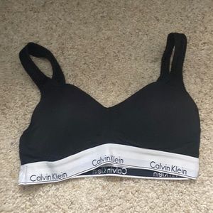 Large, black with white strip Calvin Klein bra. never worn